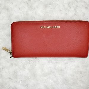 Michael Kors. Red wallet.